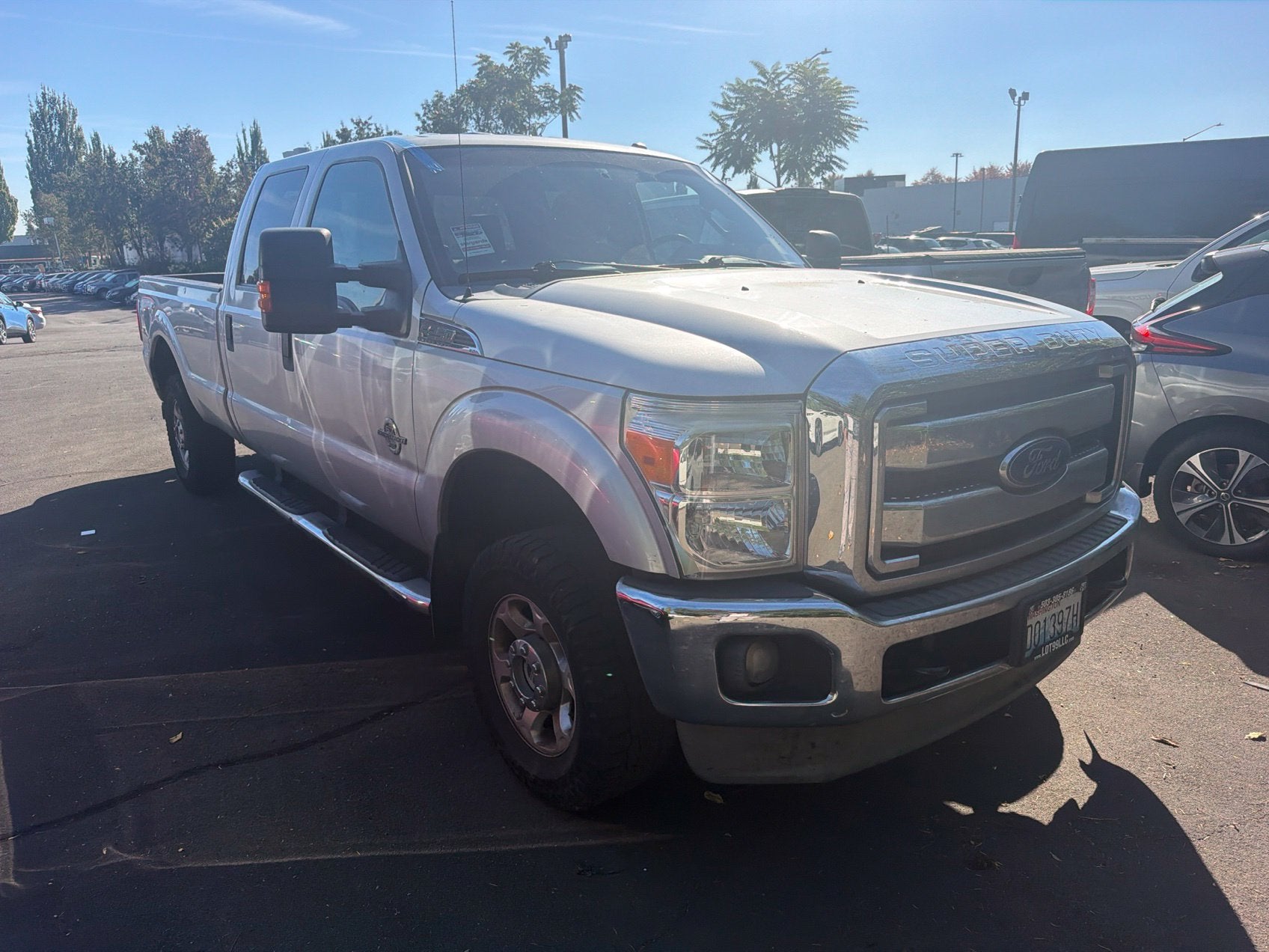 Silver 2014 Ford F-250 Super Duty Pickup Truck Four-Wheel Drive Automatic