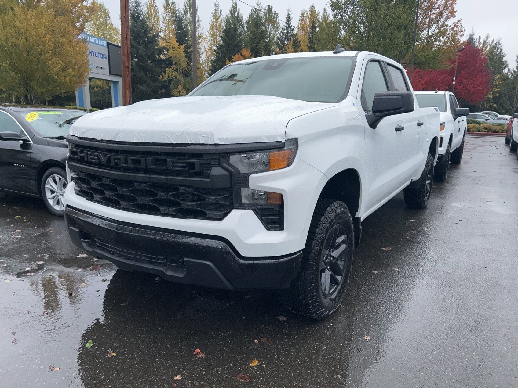 Summit White 2026 Chevrolet Silverado 1500 Custom Trail Boss Crew Cab 4WD Pickup Truck Four-Wheel Drive Automatic