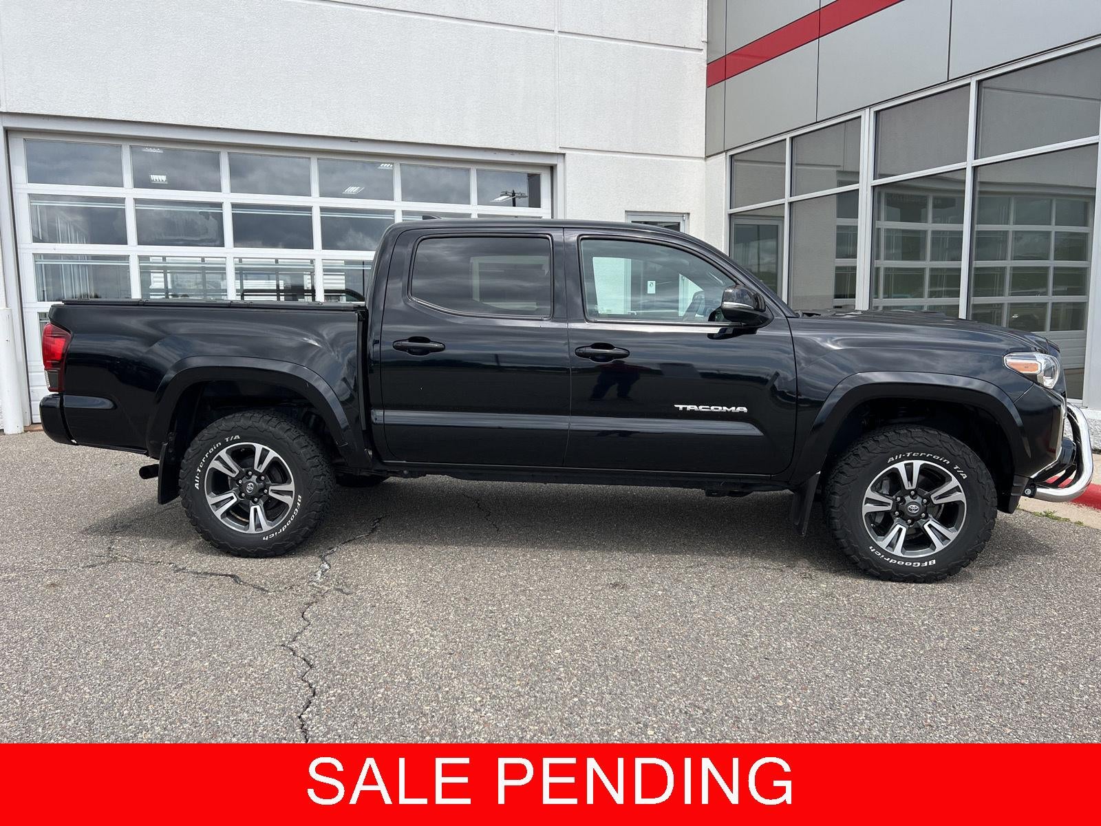 Midnight Black Metallic 2019 Toyota Tacoma Pickup Truck Four-Wheel Drive Manual