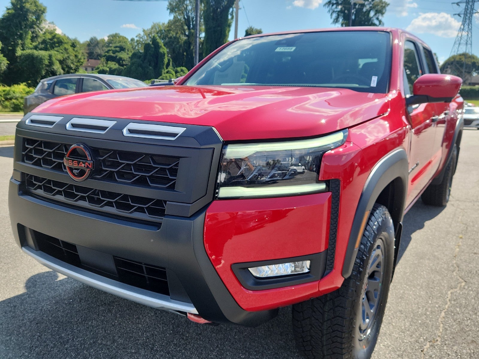 Red Alert 2027 Nissan Frontier Pickup Truck Four-Wheel Drive Automatic