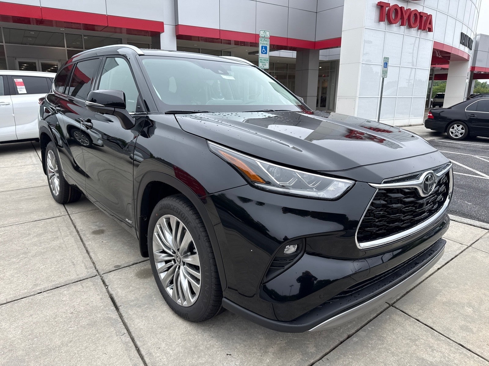 Midnight Black Metallic 2026 Toyota Highlander Hybrid Platinum AWD SUV / Crossover All-Wheel Drive Continuously Variable Transmission