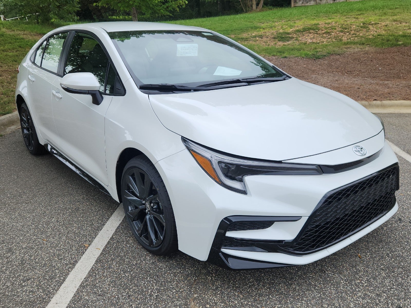 White (Wind Chill Pearl) 2026 Toyota Corolla Hybrid Sedan Front-Wheel Drive Continuously Variable Transmission