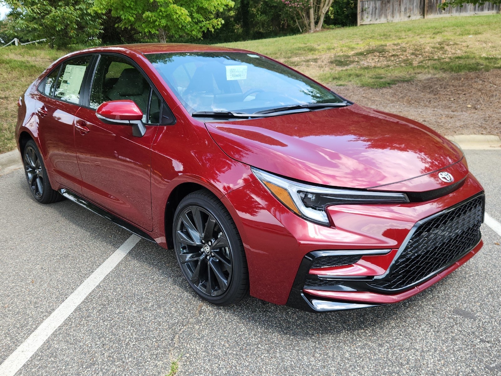 Red (Ruby Flare Pearl) 2026 Toyota Corolla Hybrid Sedan Front-Wheel Drive Continuously Variable Transmission