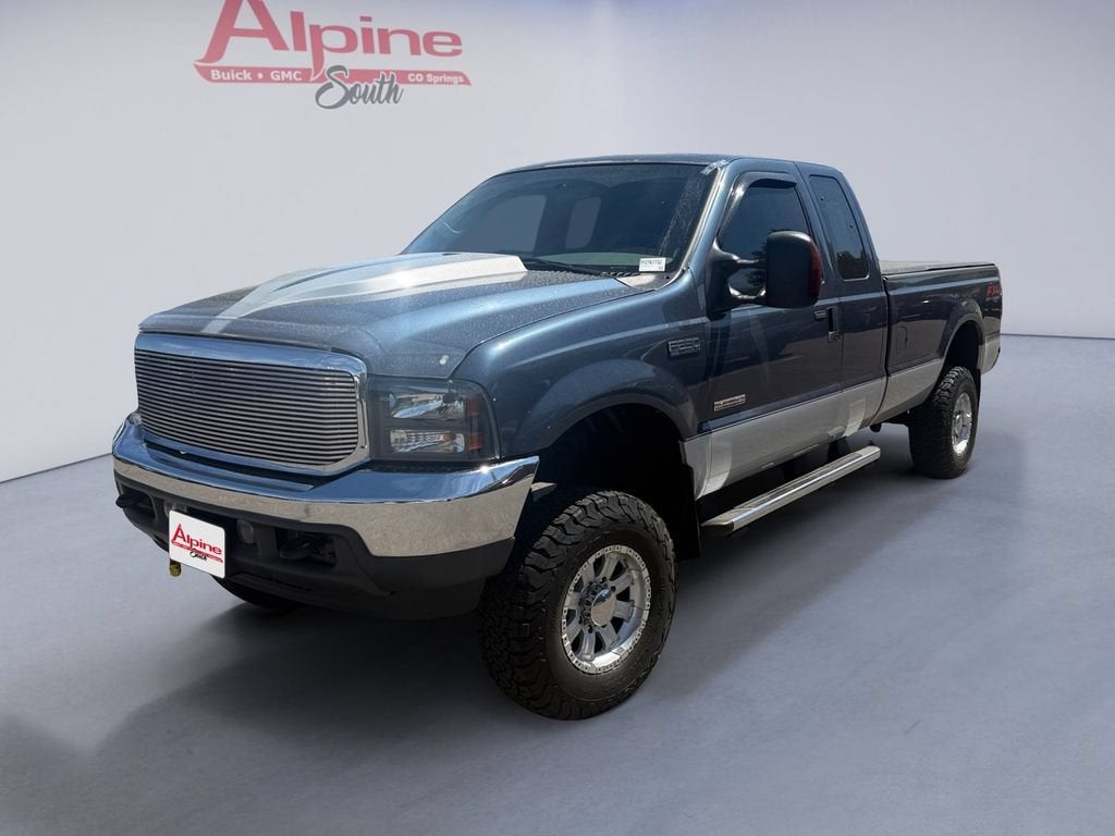 Blue 2004 Ford F-250 Super Duty Pickup Truck Four-Wheel Drive 