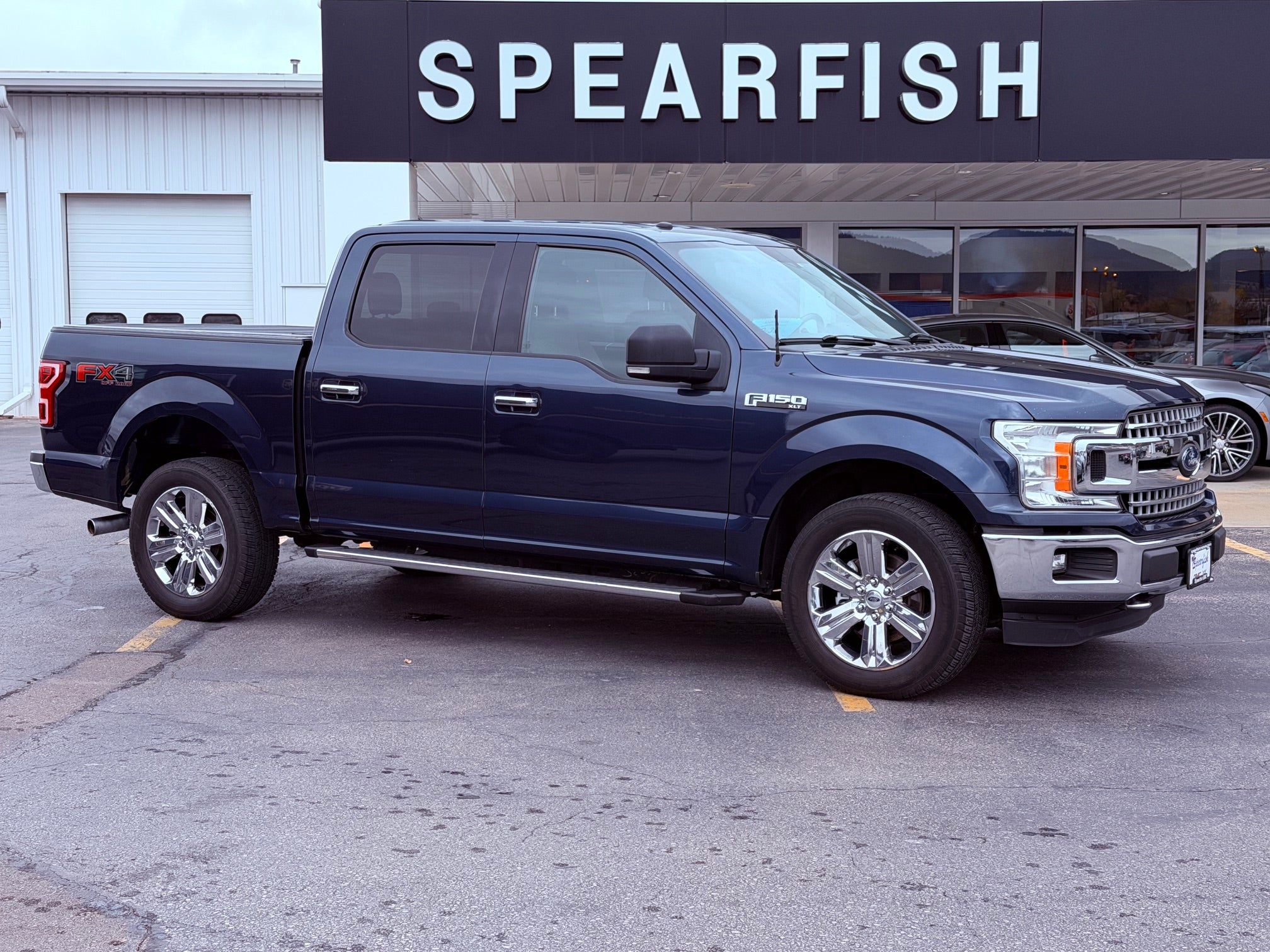 Blue 2018 Ford F-150 Pickup Truck Four-Wheel Drive 10-Speed Automatic
