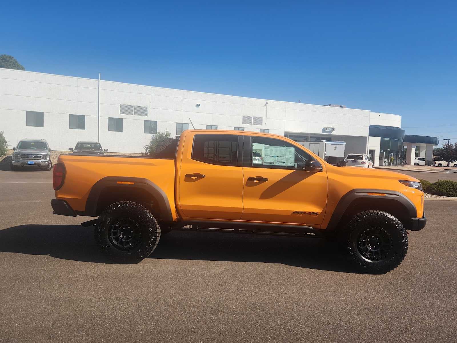 Desert Sun 2026 GMC Canyon AT4X Crew Cab 4WD Pickup Truck Four-Wheel Drive 8-Speed Automatic