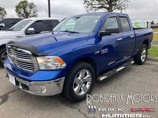 Blue 2015 RAM 1500 Pickup Truck Four-Wheel Drive Automatic