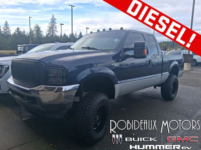 Blue 2004 Ford F-250 Super Duty Pickup Truck Four-Wheel Drive Manual