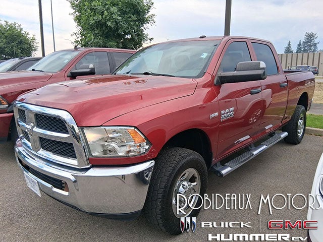Red 2013 RAM 2500 Pickup Truck Four-Wheel Drive 