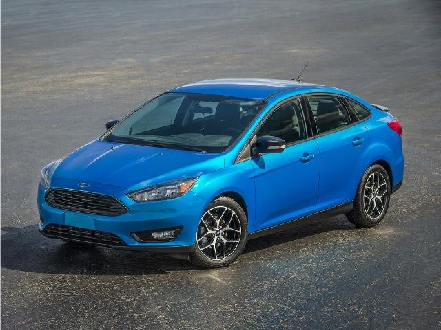 Red 2015 Ford Focus Sedan Front-Wheel Drive 