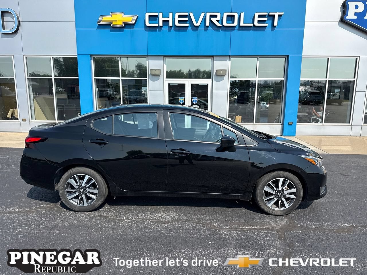 Black 2025 Nissan Versa Sedan Front-Wheel Drive Automatic