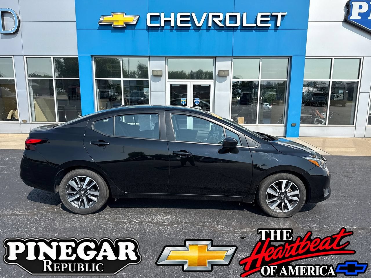 Black 2025 Nissan Versa Sedan Front-Wheel Drive Automatic