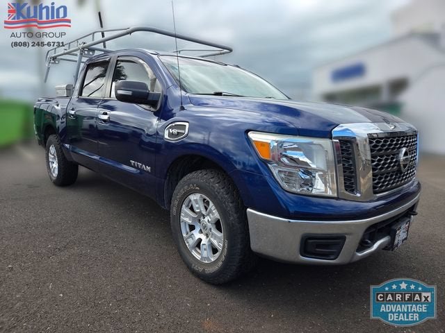 Blue 2017 Nissan Titan Pickup Truck Four-Wheel Drive Automatic