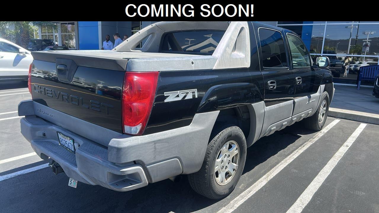Black 2003 Chevrolet Avalanche Pickup Truck Four-Wheel Drive Automatic