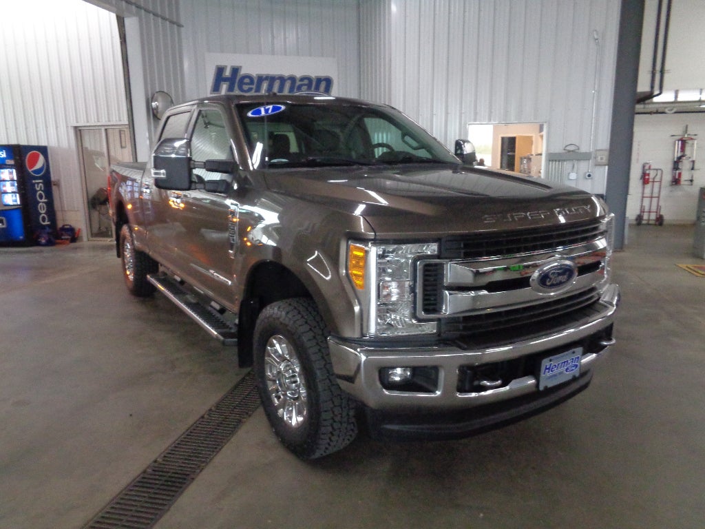 Brown (Tan) 2017 Ford F-250 Super Duty Pickup Truck Four-Wheel Drive Automatic