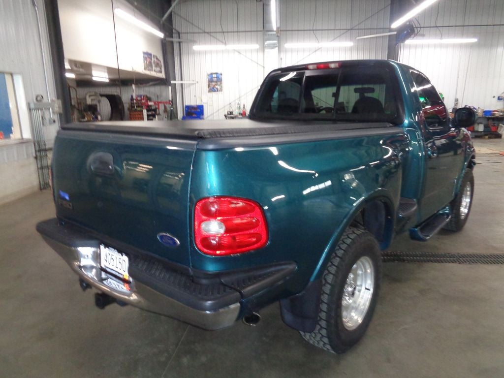 View vehicle photo 3