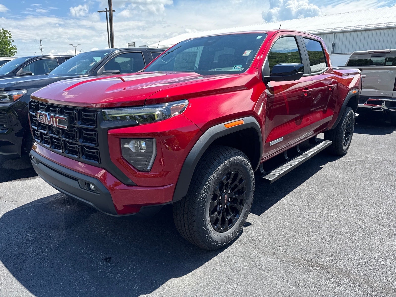 Volcanic Red Tintcoat 2026 GMC Canyon Pickup Truck Four-Wheel Drive Automatic