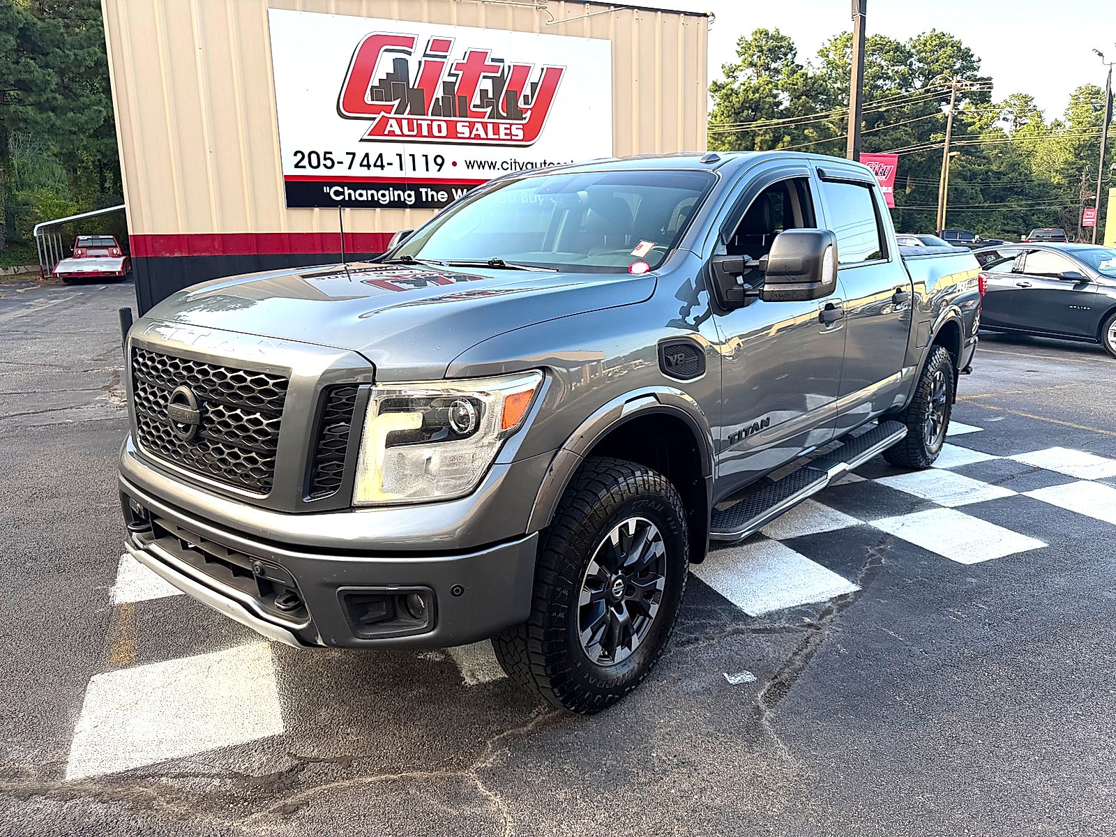 Gray (Gun Metallic) 2017 Nissan Titan Pickup Truck Four-Wheel Drive 7-Speed Automatic