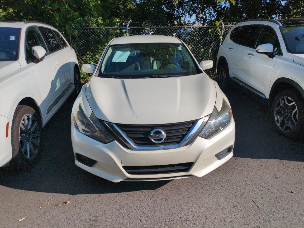 Pearl White 2016 Nissan Altima Sedan Front-Wheel Drive Automatic
