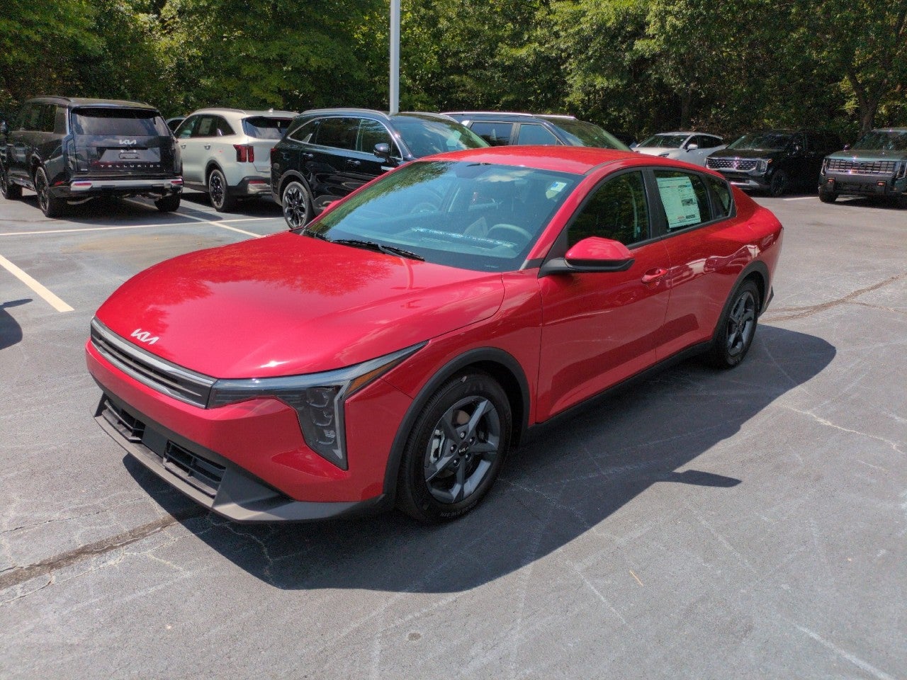 Red 2026 Kia K4 Sedan Front-Wheel Drive Automatic