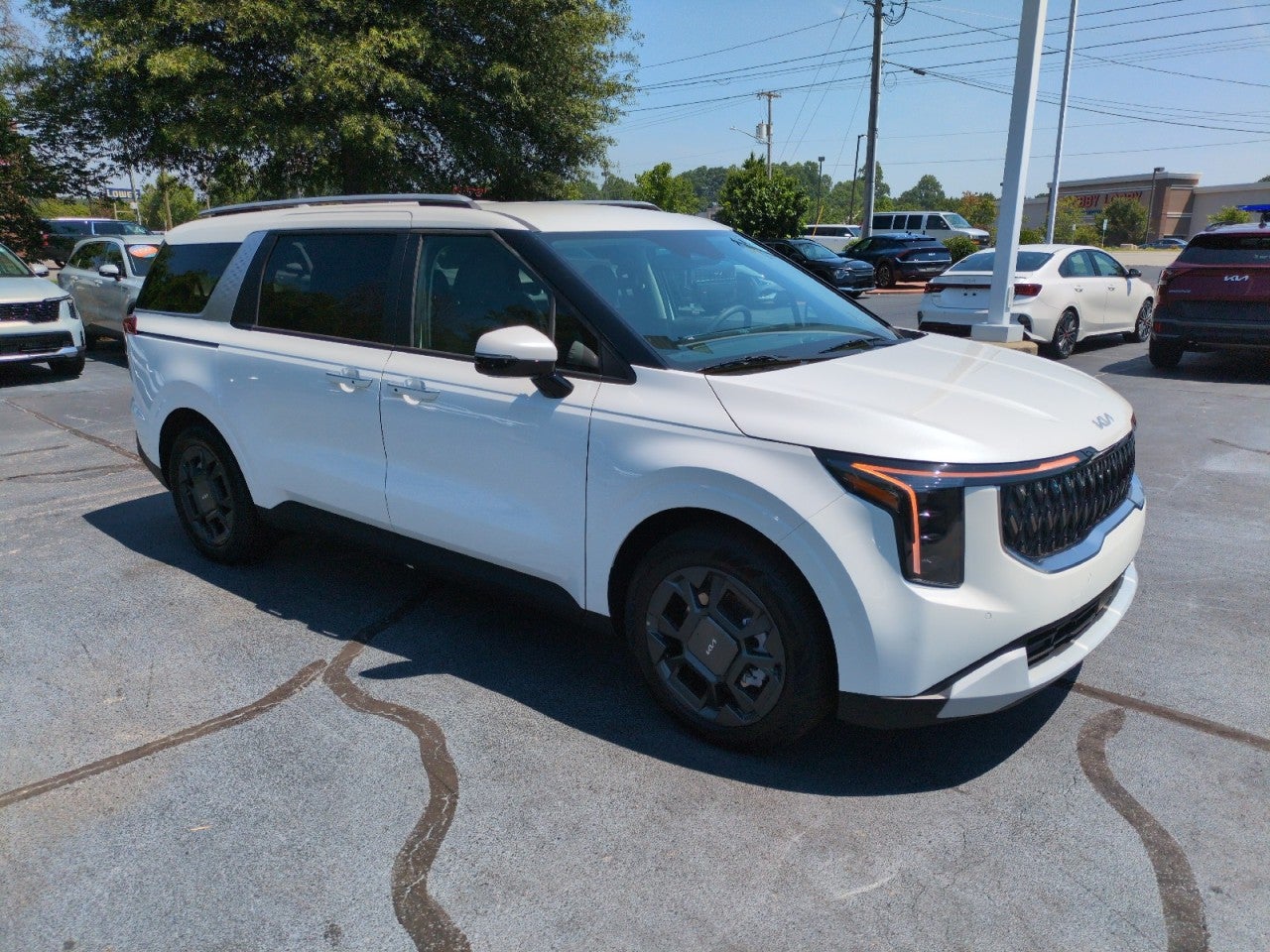 White 2026 Kia Carnival Hybrid Minivan Front-Wheel Drive Automatic