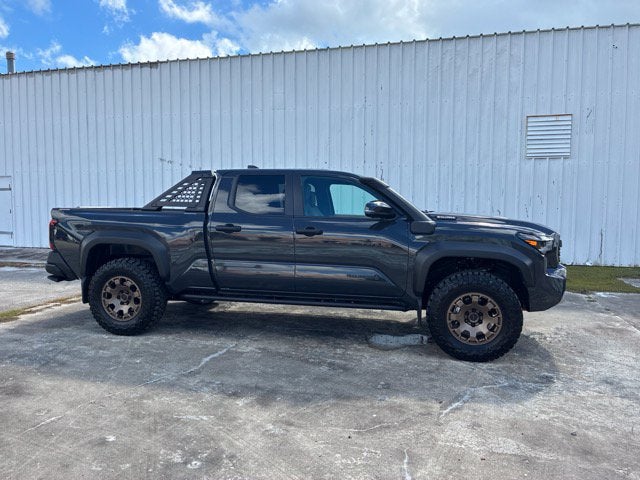 2026 Toyota Tacoma Hybrid TRAILHUNTER Crew Cab Pickup Slide