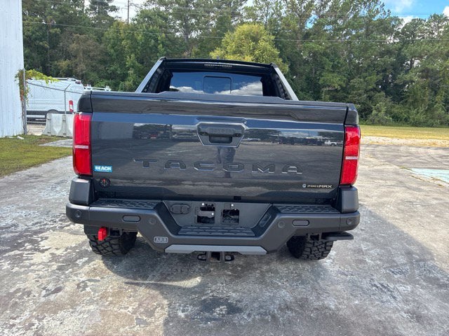 2026 Toyota Tacoma Hybrid TRAILHUNTER Crew Cab Pickup Slide 2