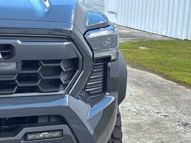 2026 Toyota Tacoma Hybrid TRAILHUNTER Crew Cab Pickup Slide 7