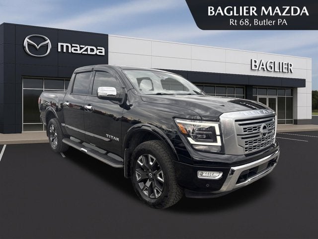 Super Black 2023 Nissan Titan Platinum Reserve Crew Cab 4WD Pickup Truck Four-Wheel Drive Automatic