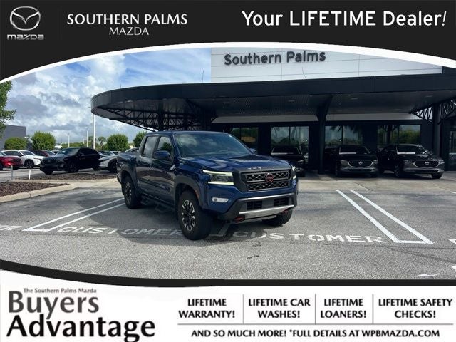 Deep Blue Pearl 2023 Nissan Frontier Pickup Truck Four-Wheel Drive 9-Speed Automatic