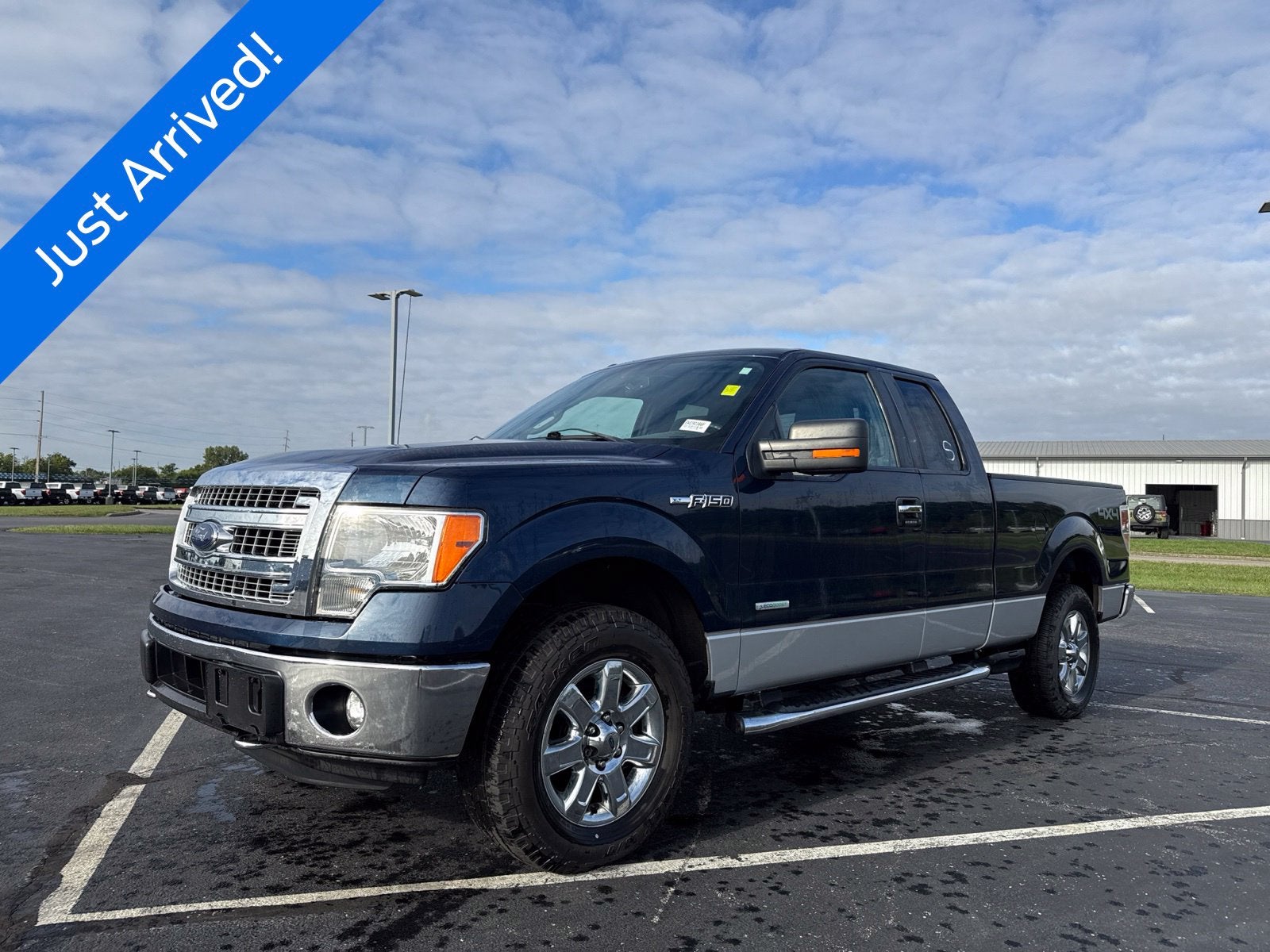 Blue 2014 Ford F-150 Pickup Truck Four-Wheel Drive Automatic