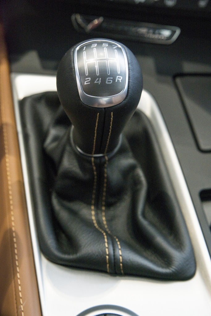 The gray Corvette (custom-built by a customer) is a 7-speed manual. The Velocity Yellow (currently looking for a home) Corvette is an 8-speed Paddle Shift Automatic Transmission. Both have Performance Gear Ratios.