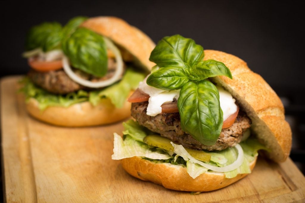 Two hamburgers, look like they are possibly vegan.