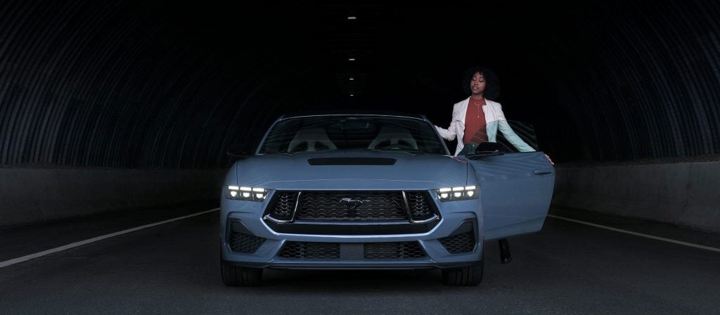 A blue 2024 Ford Mustang.