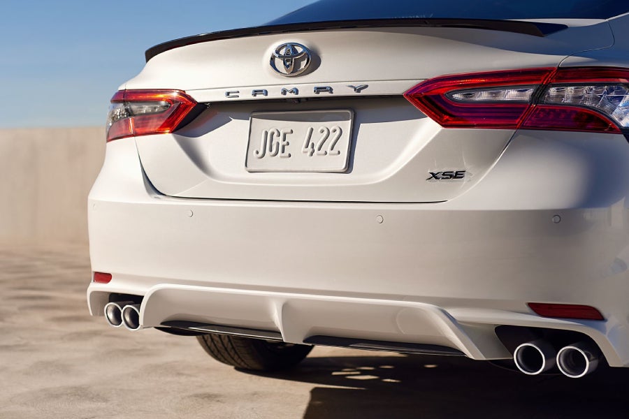 back of white Toyota Camry