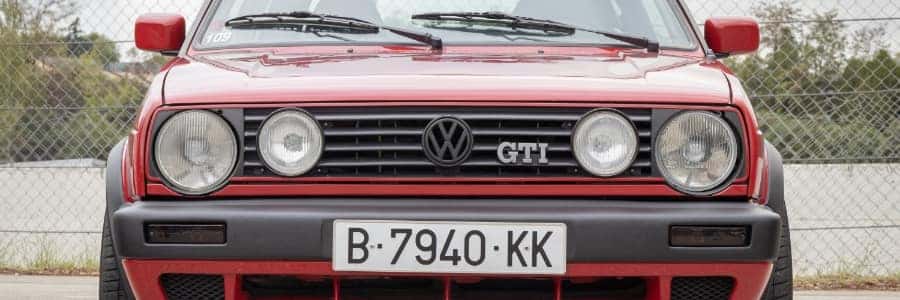 front view of a red Golf GTI mark 2 with European plates