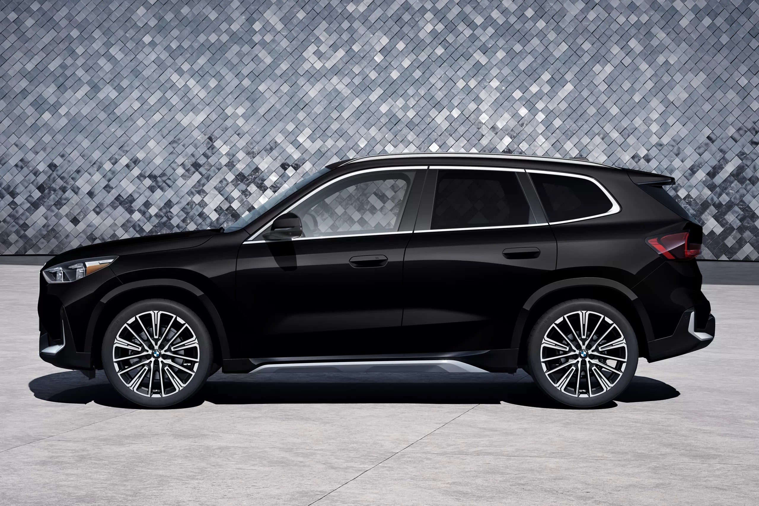 A black 2026 BMW X1 parked in Rockford, IL