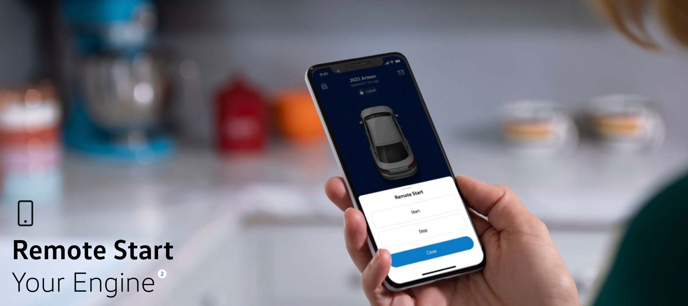 A woman using the VW car-net app to remotely start her Volkswagen in Rockford, Illinois.