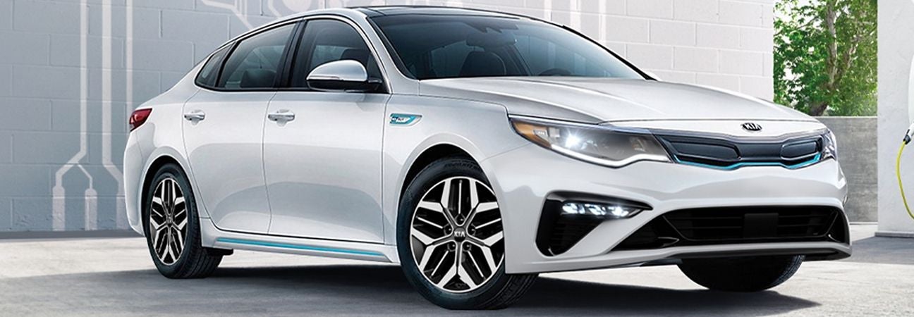 2020 kia optima plug-in hybrid parked in a parking garage