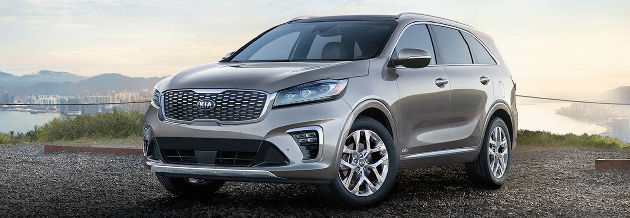 A 2019 Kia Sorento against a city skyline