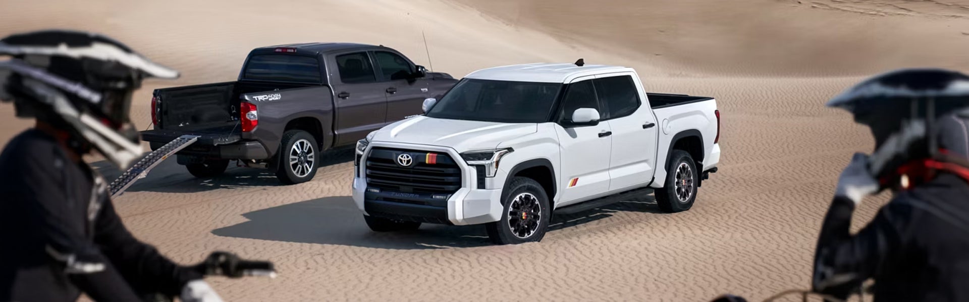 Toyota Trucks on desert dunes