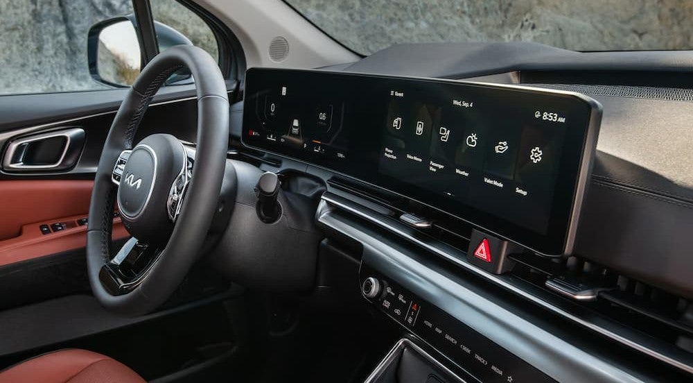 Black dash in a 2026 Kia Carnival.