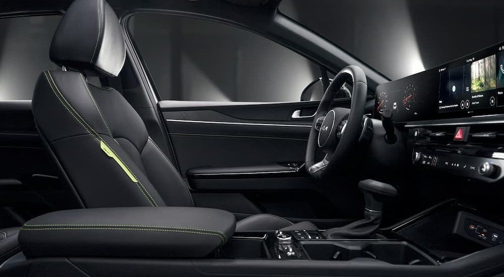 Black interior and dash in a 2026 Kia K5.