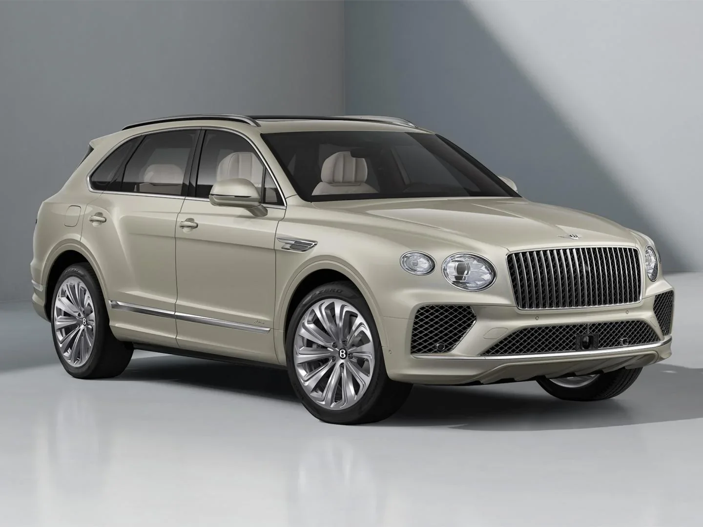 Bentley Bentayga Azure in White Sand with vertical-vaned chrome grille