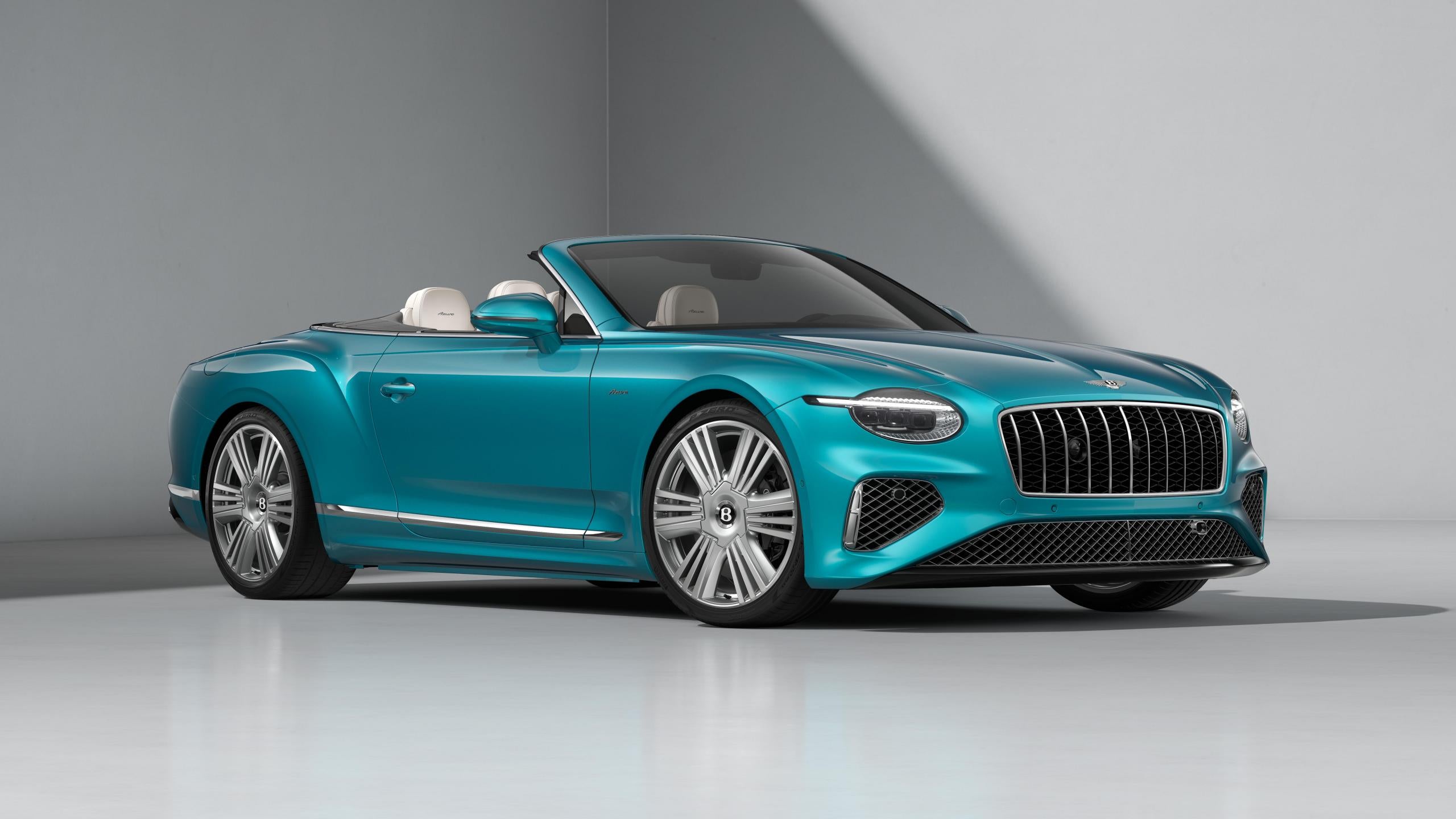 Bentley Continental GTC Azure in Topaz Blue with the roof lowered