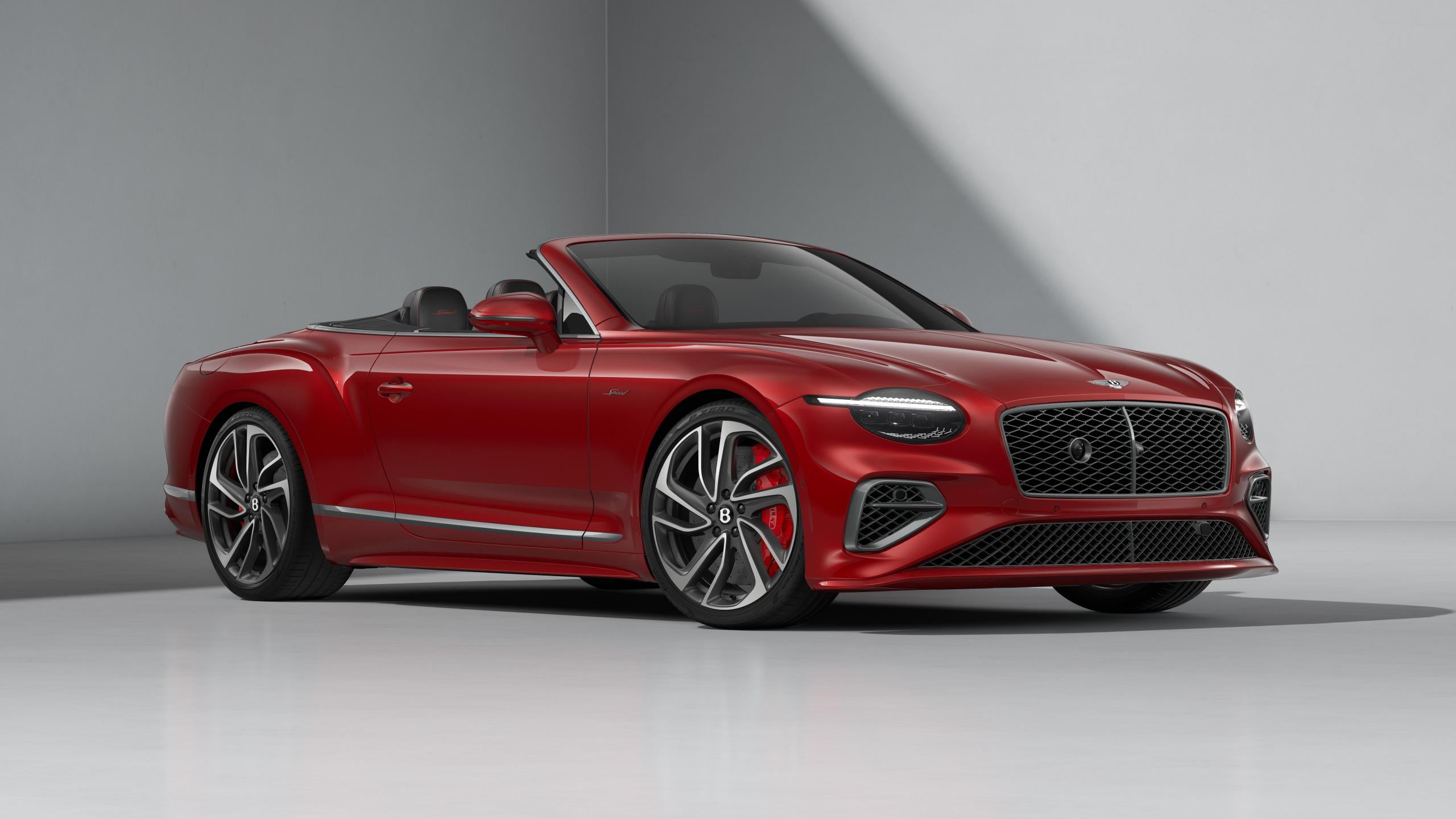 Bentley Continental GTC Speed in Dragon Red with the roof lowered