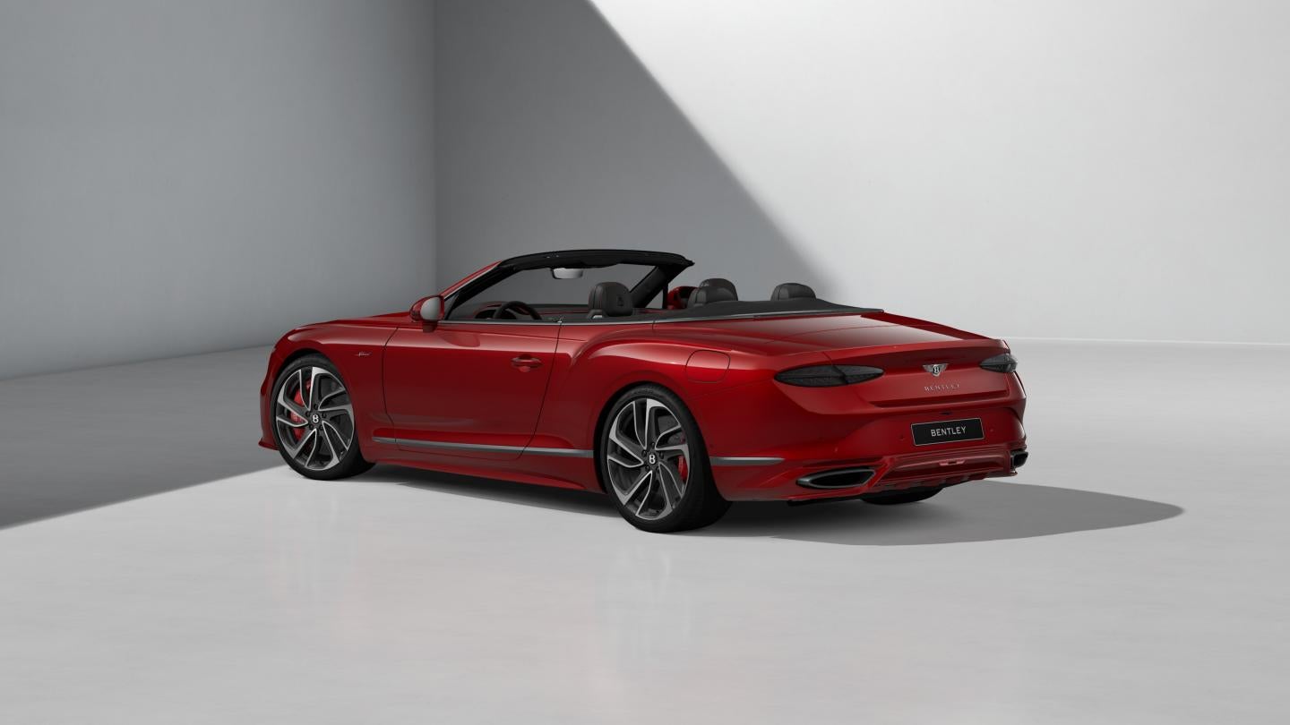 Rear three-quarter view of the Continental GTC Speed with its roof down