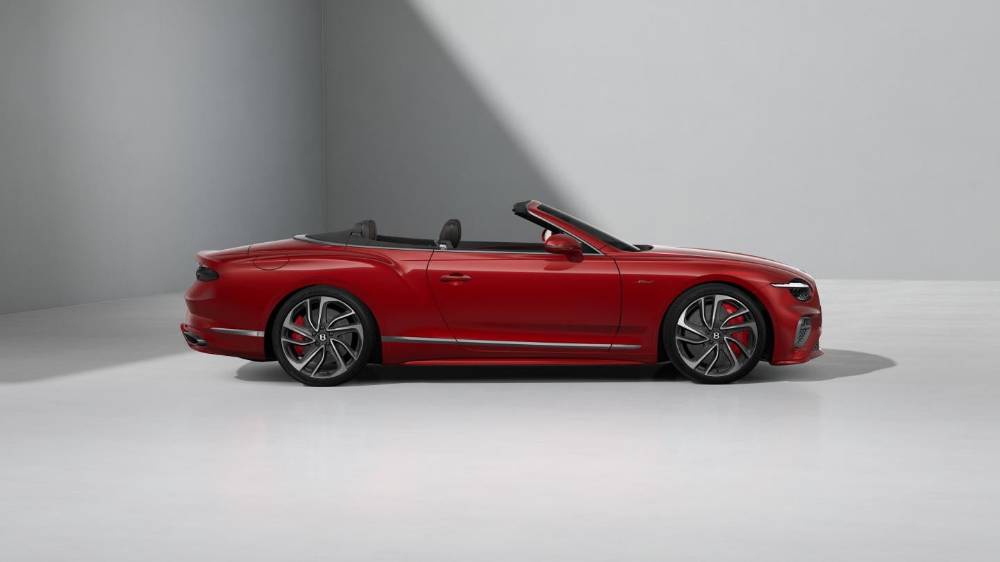 Side profile of the Continental GTC Speed convertible in Dragon Red