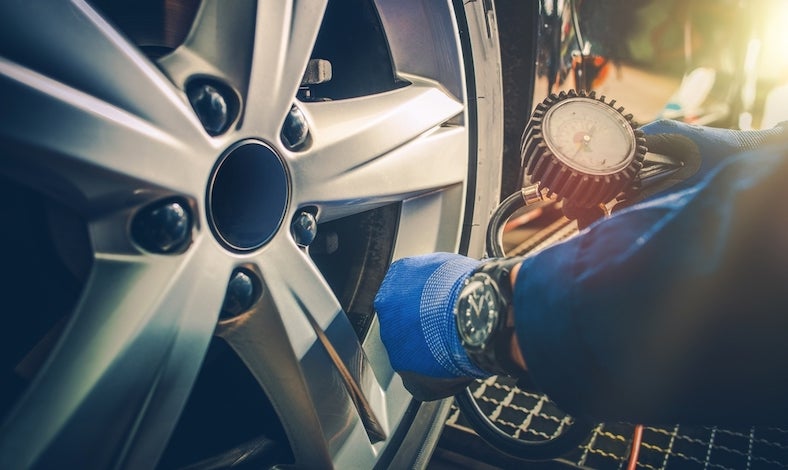 Checking Tire Pressure Checking Tire Pressure