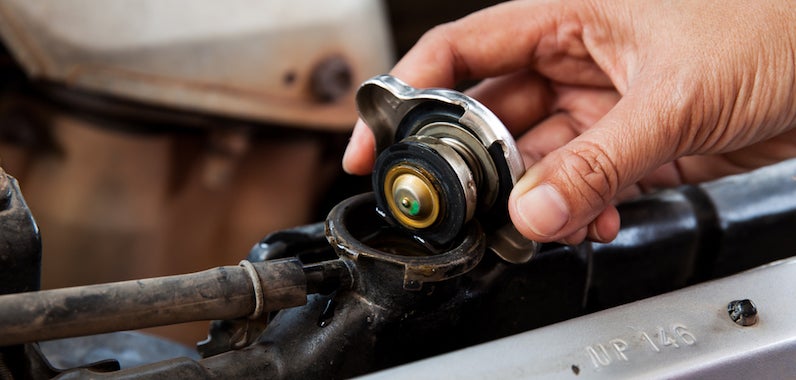 Checking coolant in the radiator